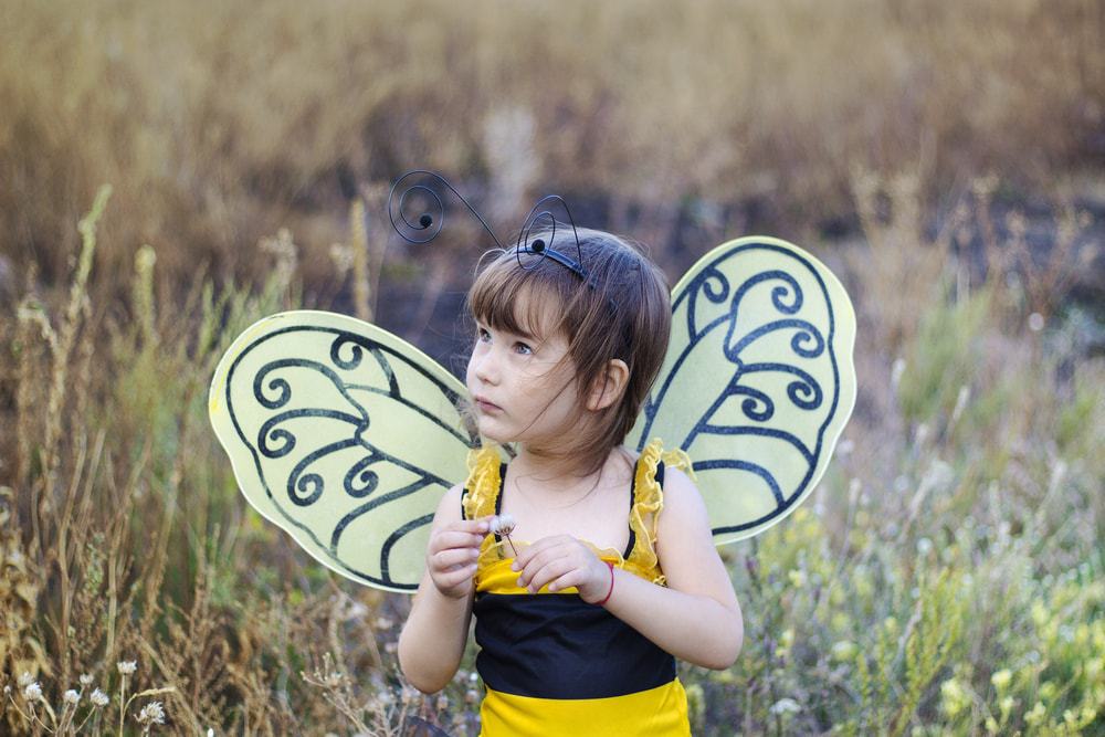 girl in a bee costume